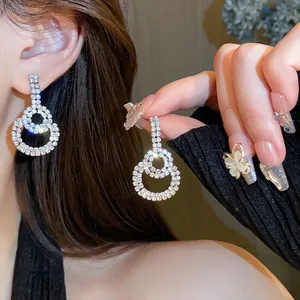 Elegant silver needle double circle rhinestone drop earrings for modern women.