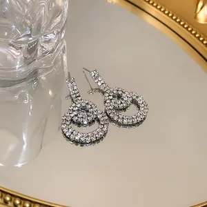 Elegant double circle rhinestone drop earrings with silver needles in a luxury style