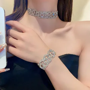 Detailed view of elegant sparkling rhinestone choker necklace and matching bracelet set