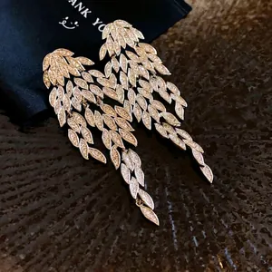 Sparkling silver needle zircon leaf tassel earrings for elegant evening fashion