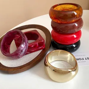 Minimalist resin geometric bangles collection in multiple colors and unique designs