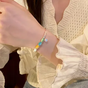 Minimalist colorful cylindrical beaded elastic bracelet with silver accents for women