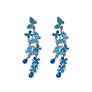 Elegant silver needle butterfly tassel earrings with blue crystals for women