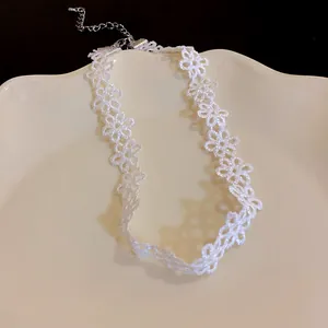 Elegant white lace flower choker necklace with adjustable chain for a delicate look