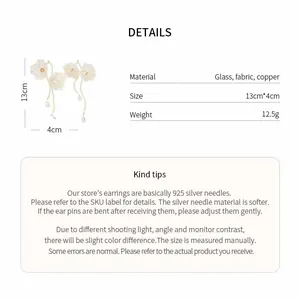 Product detail view for floral fabric tassel earrings including size, weight, and material