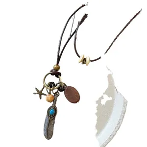 Collier ethnique avec pendentif plume et étoile de mer pour femmes style vintage