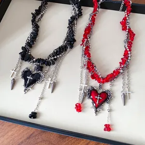 Gothic heart necklaces with irregular crushed stones and cross charms in black and red
