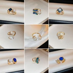 Bague en Perle d'Eau Douce Plaquée Or Véritable Pour Femme Fleur à Quatre Pétales Papillon Bague Ajustable Bijoux de Luxe Cadeau