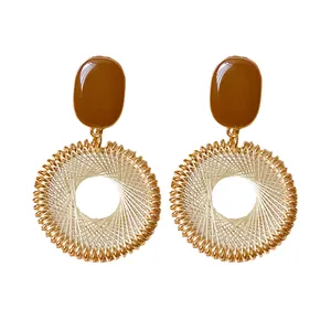 Retro ethnic woven circle hoop earrings with brown oval studs and gold-tone finish