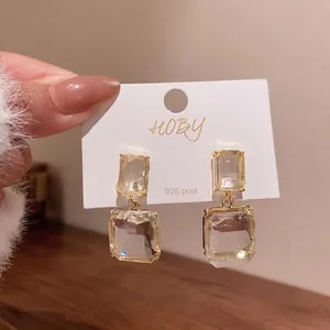 Elegant transparent square crystal drop earrings with 925 silver post on white display card