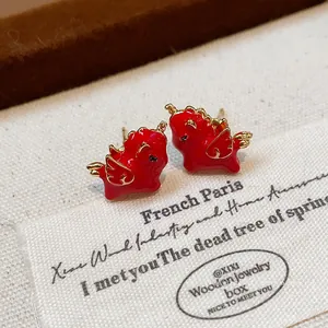 Elegant red enamel winged horse stud earrings with silver needles for zodiac year