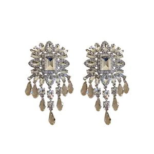 Exaggerated silver needle earrings with square glass beads and crystal tassels