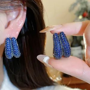 Sparkling blue zircon pave hoop earrings with a geometric design for elegant women