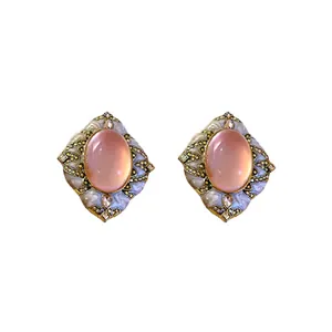 Eleganti orecchini a perno vintage con pietre ovali rosa e strass scintillanti