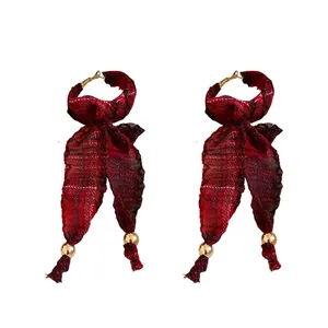 Vintage red plaid fabric bow tassel earrings with elegant golden bead accents for women