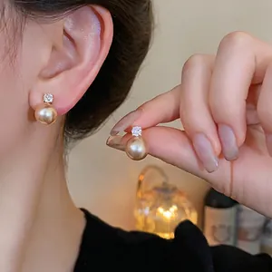 Elegant champagne pearl stud earrings with sparkling zircon and S925 silver needles.