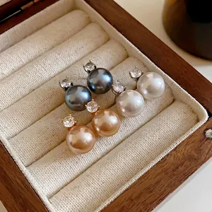 Elegant retro zircon pearl stud earrings set in white, grey, and champagne gold