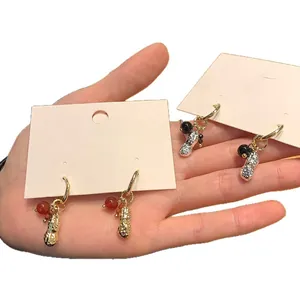 Elegant Korean style peanut dangle earrings with glass beads and shimmering metal hoops