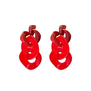 Chunky red acrylic chain link drop earrings with marble effect design and silver post