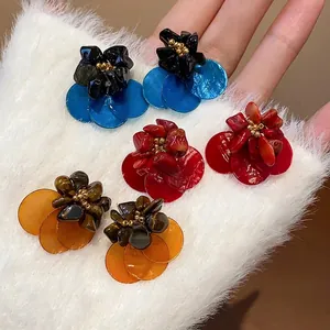 Vintage shell and tiger eye stone flower stud earrings set in three elegant colors for women