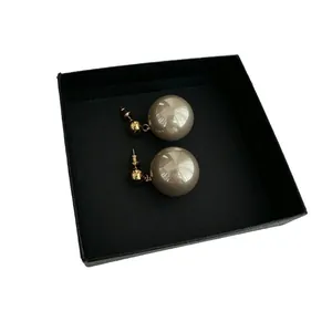 Elegant champagne pearl ball stud earrings with gold plating in a premium gift box
