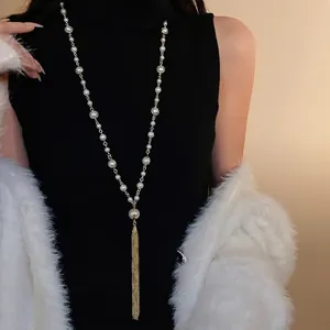 Elegant artificial pearl tassel necklace, a vintage-style long sweater chain for women.