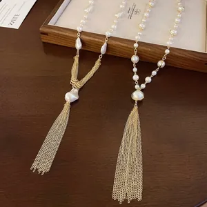 Elegant vintage faux pearl tassel sweater chain necklace with sophisticated gold-tone finish