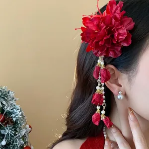 Elegant red fabric flower hair clip with decorative pearl tassels and hanging petals