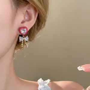 Elegant silver needle heart and bow dangling earrings with sparkling crystals for women