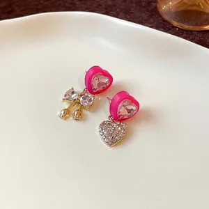 Exquisite hot pink heart and bow asymmetric earrings with sparkling clear rhinestones