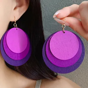 Large triple layered purple wooden disc earrings for women in trendy bohemian style