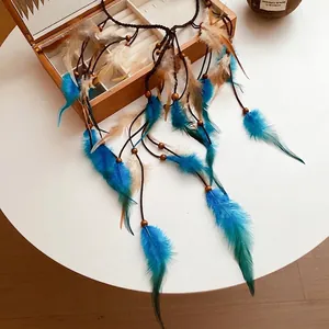 Elegant Bohemian style feather headband with wooden beads and vibrant blue tassels decoration