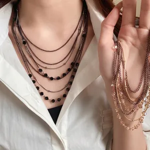Vintage multi-layer glass bead necklace with layered chains for women in retro style