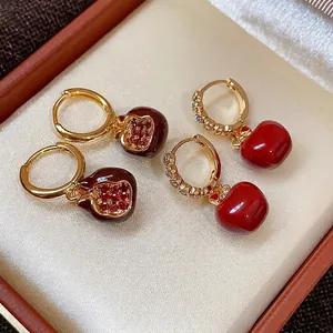 Luxury gold-plated zircon apple and pomegranate earrings in a beautiful jewelry gift box