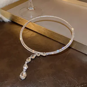 Close-up detail shot of luxury waterdrop zircon choker necklace with sparkling stones for parties