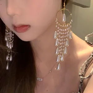 Elegant long tassel earrings featuring pearls and zirconia in vintage palace style jewelry