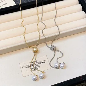 Elegant zircon sliding pearl necklace available in gold and silver minimalist style