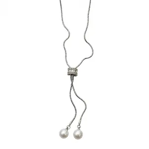 Elegant silver-tone lariat necklace featuring zircon ring and white pearl pendants