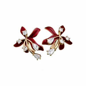 Elegant 18k gold plated flower stud earrings with vibrant red enamel and sparkling zircon stones