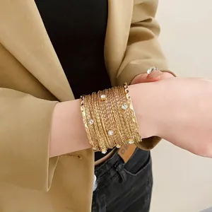 Elegante bracciale rigido multicrato dorato con strass, gioiello alla moda da donna