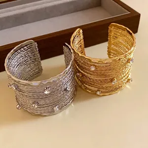Eleganti bracciali rigidi aperti multistrato con strass di cristallo in oro e argento