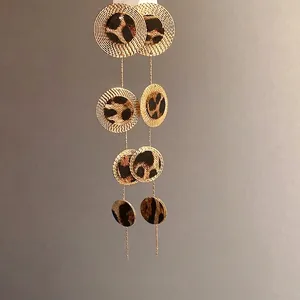 Élégantes boucles d'oreilles pendantes en cuir léopard tissé doré pour femmes