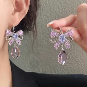 Elegante Zirkon Schmetterling Wassertropfen Ohrringe mit lila Kristallen Damen