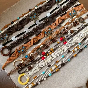 Selection of handcrafted bohemian woven waist chains with wooden beads and charms