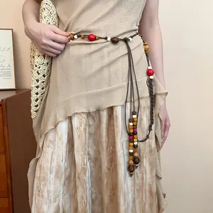 Detailed view of Bohemian braided hemp rope waist chain with colorful wooden beads