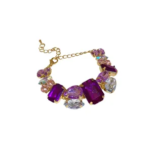 Elegant vintage style bracelet featuring vibrant multi-colored crystals and gold-plated finish