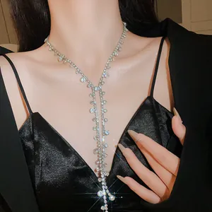 Close-up of sparkling rhinestone tassel necklace with elegant Y-shaped drop design.
