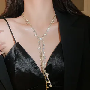 Elegant Y-shaped rhinestone fringe necklace featuring circular geometric crystal drops for party.