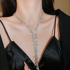Close-up view of a sparkling rhinestone tassel necklace featuring elegant dangling crystals