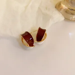 Chic Maillard style coffee and white curved stud earrings with silver needles for women
